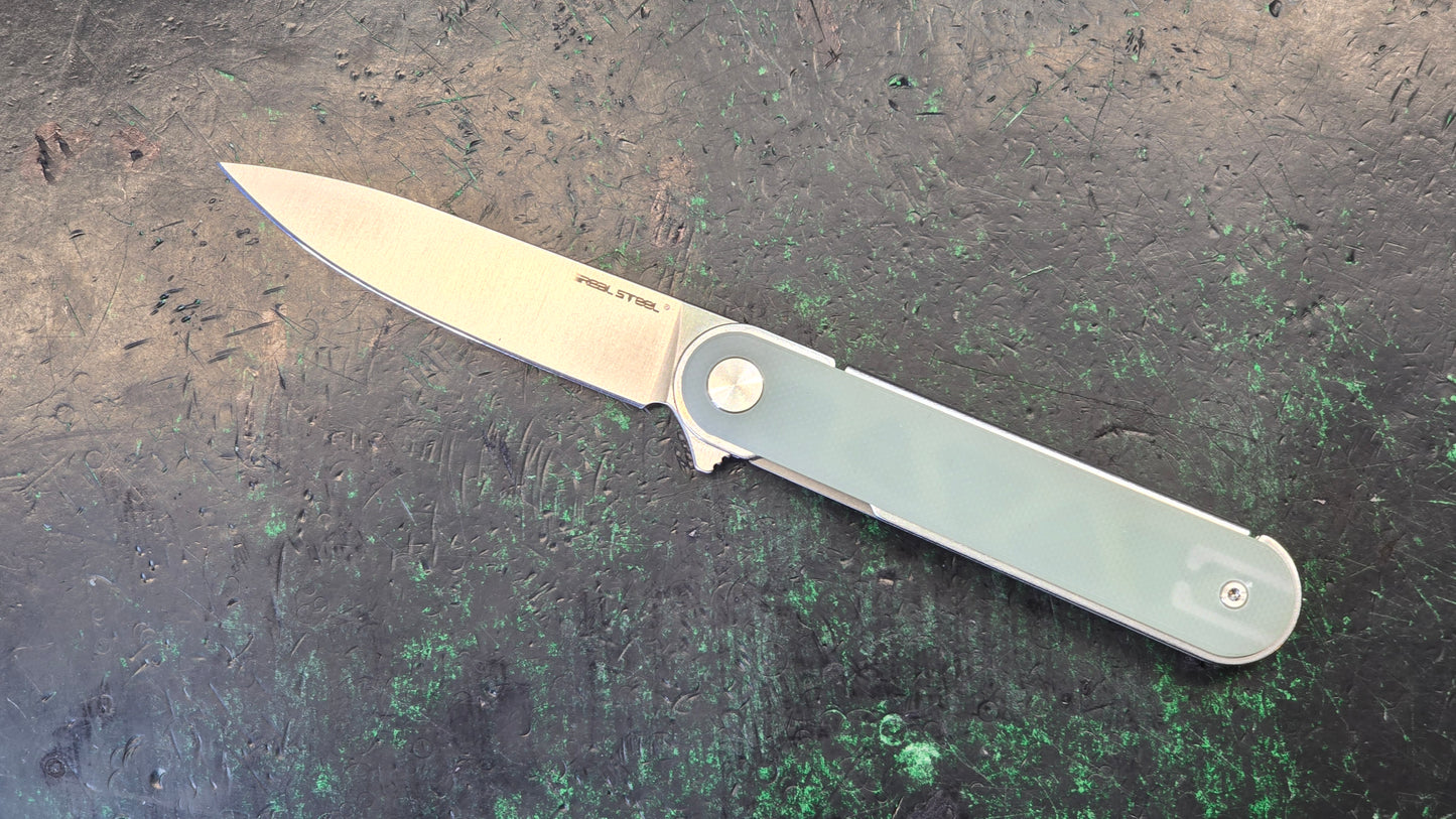 Real Steel Iris Natural G10 Satin 12C27 (New - OPEN BOX)