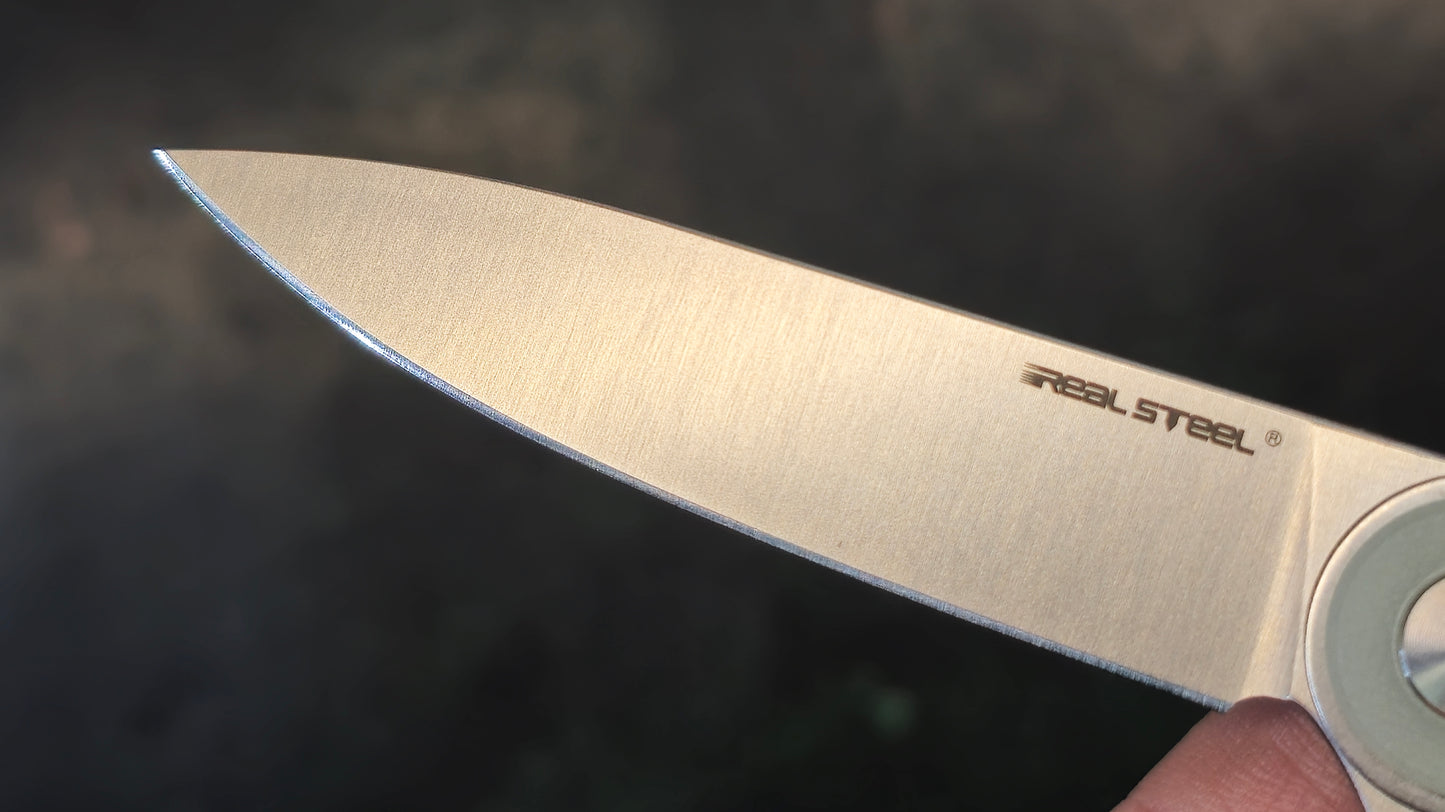 Real Steel Iris Natural G10 Satin 12C27 (New - OPEN BOX)