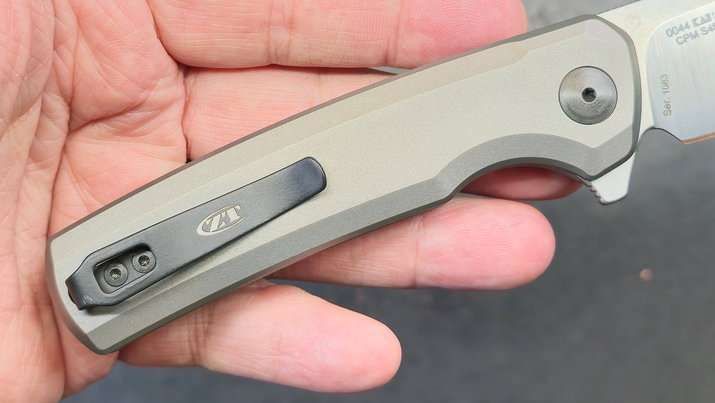 Zero Tolerance ZT0044 Button Lock Silver Titanium Handle S45VN (NEW)