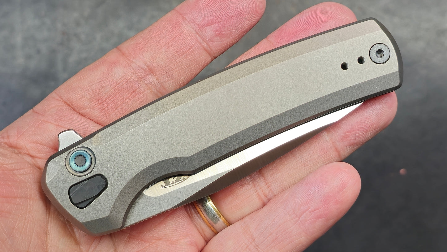 Zero Tolerance ZT0044 Button Lock Silver Titanium Handle S45VN (NEW)