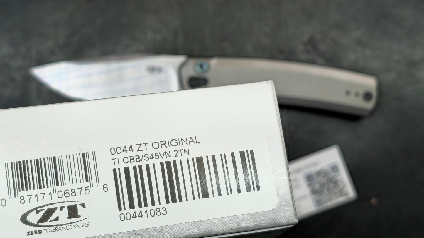 Zero Tolerance ZT0044 Button Lock Silver Titanium Handle S45VN (NEW)