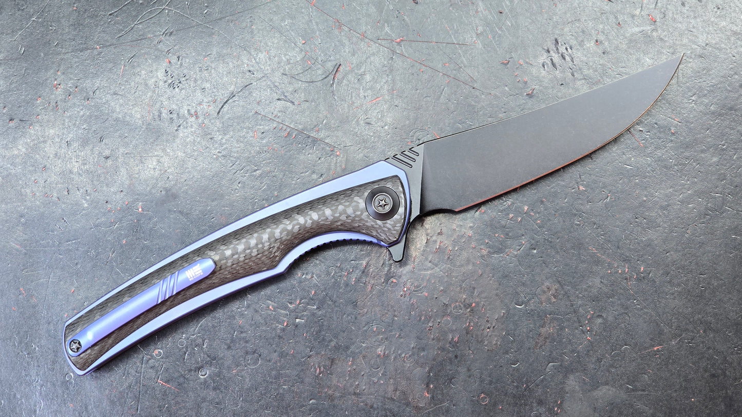 We Knife 704CF Black Carbon Fiber Over Blue Titanium Handle 3.6” Bohler M390 (NEW)