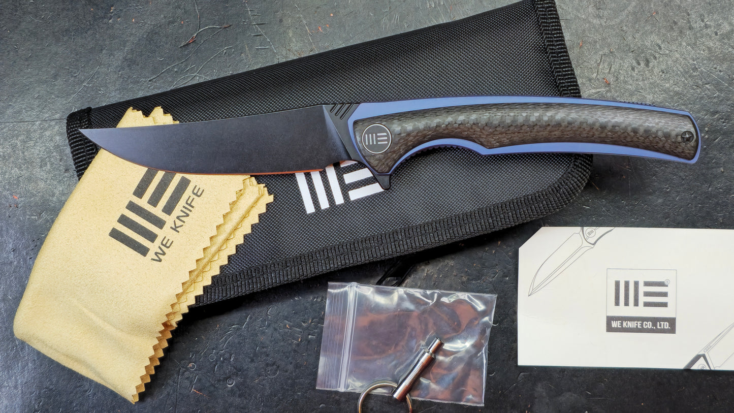 We Knife 704CF Black Carbon Fiber Over Blue Titanium Handle 3.6” Bohler M390 (NEW)