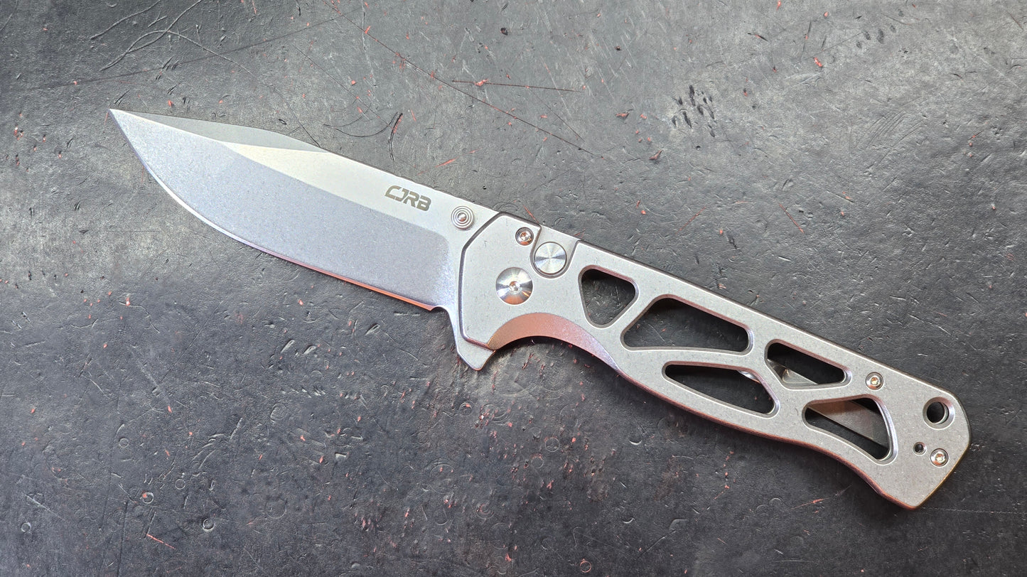 CJRB Chord Button Lock Folding Knife Stainless Skeletonized Handle AR-RPM9 (NEW)