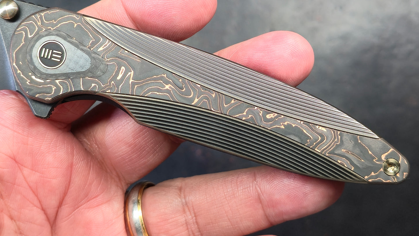 WE Zenthra Bronze/Black Titanium/Copper Foil Carbon Fiber Handle M390 (NEW)