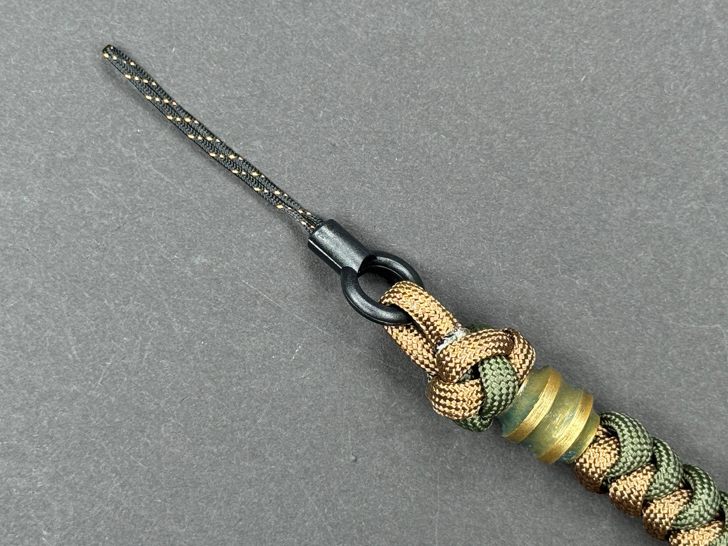 Custom Knife Lanyard โ Brown & Green Paracord with Intricate Warrior Helmet Bead
