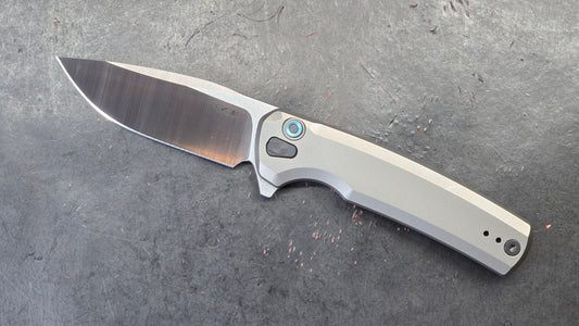 Zero Tolerance ZT0044 Button Lock Silver Titanium Handle S45VN (NEW)