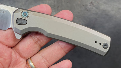 Zero Tolerance ZT0044 Button Lock Silver Titanium Handle S45VN (NEW)