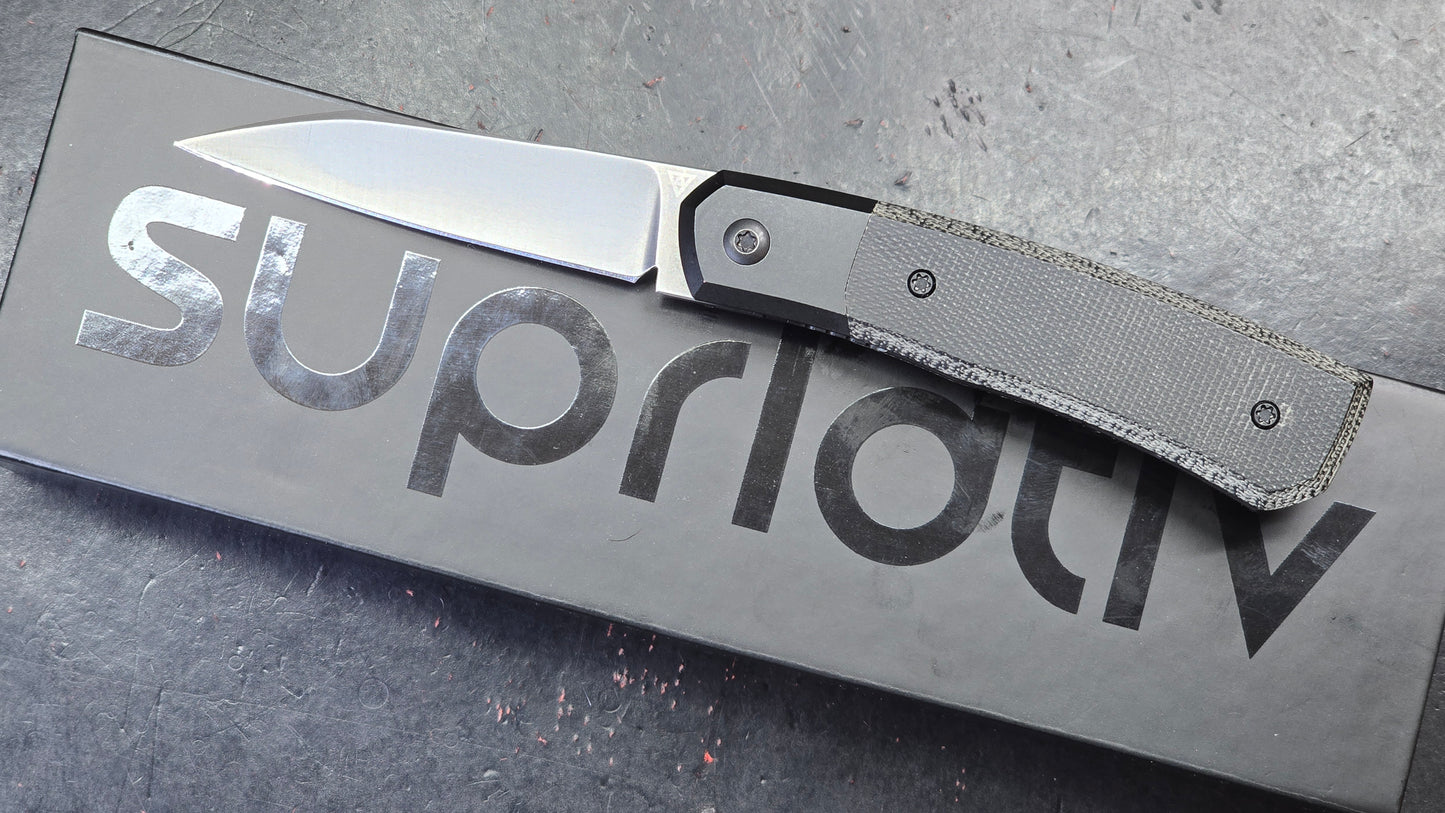 Suprlativ Canibl Micarta, titanium, M390 (USED)