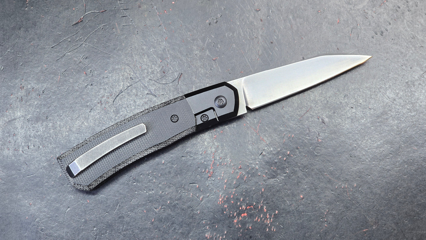 Suprlativ Canibl Micarta, titanium, M390 (USED)