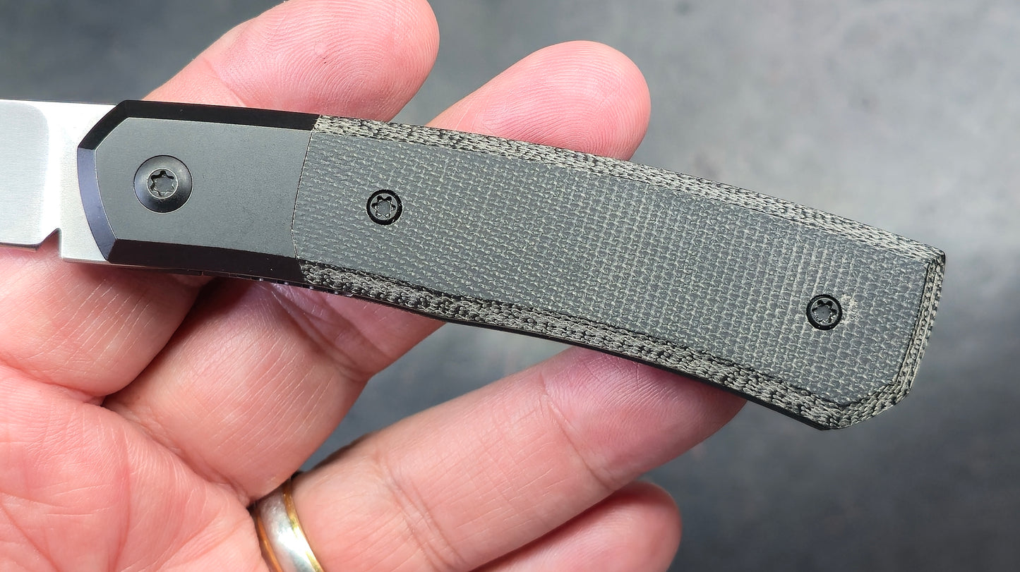 Suprlativ Canibl Micarta, titanium, M390 (USED)