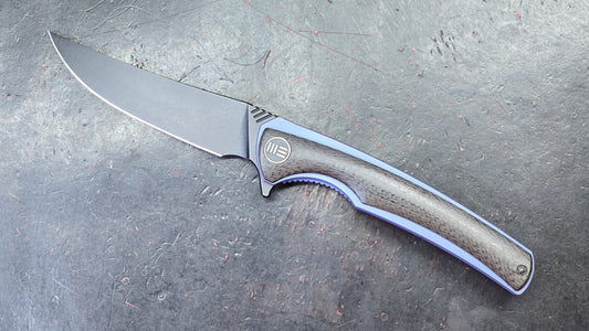 We Knife 704CF Black Carbon Fiber Over Blue Titanium Handle 3.6” Bohler M390 (NEW)