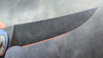 We Knife 704CF Black Carbon Fiber Over Blue Titanium Handle 3.6” Bohler M390 (NEW)