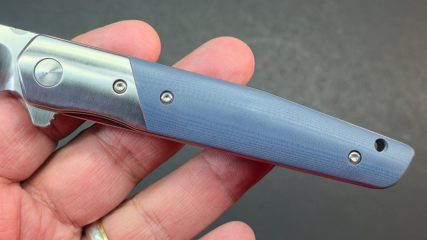 Trivisa Leominor-03G Folding Knife Blue G10 Handle K110