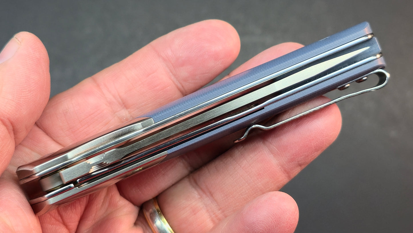 Trivisa Leominor-03G Folding Knife Blue G10 Handle K110