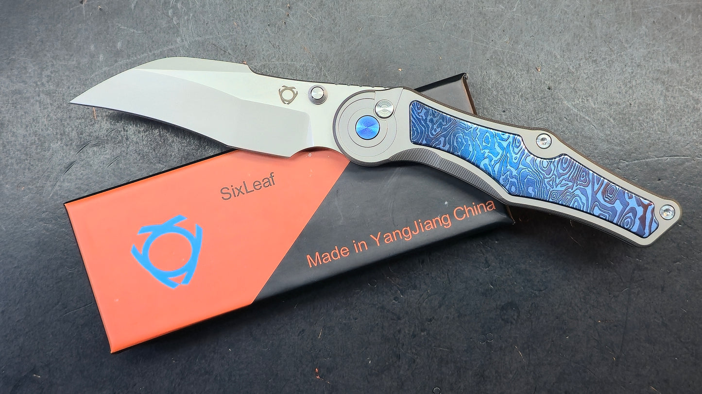 Sixleaf SL-99 Button Lock Blue Ano / TiDamascus 14C28N (SALE price in cart)