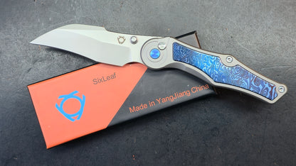 Sixleaf SL-99 Button Lock Blue Ano / TiDamascus 14C28N (SALE price in cart)