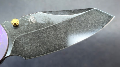Kansept Caveman Purple Anodized and Stonewashed Titanium with CNC-machined Rock Pattern | 3.57" CPM 20CV Blade