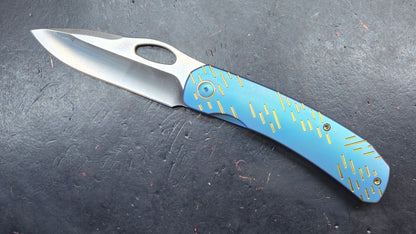 WEKNIFE Inmate Gray/Blue Raindrop Titanium Handle 20CV (DISCOUNT IN CART)