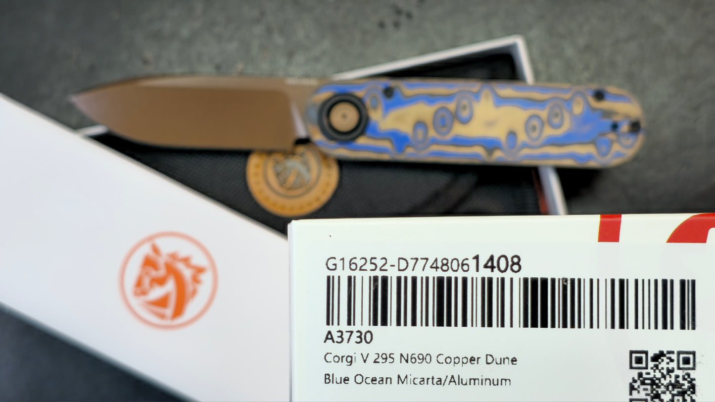 Vosteed Corgi V 295 Blue Ocean Micarta & Aluminum N690 Copper Dune