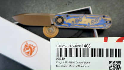 Vosteed Corgi V 295 Blue Ocean Micarta & Aluminum N690 Copper Dune