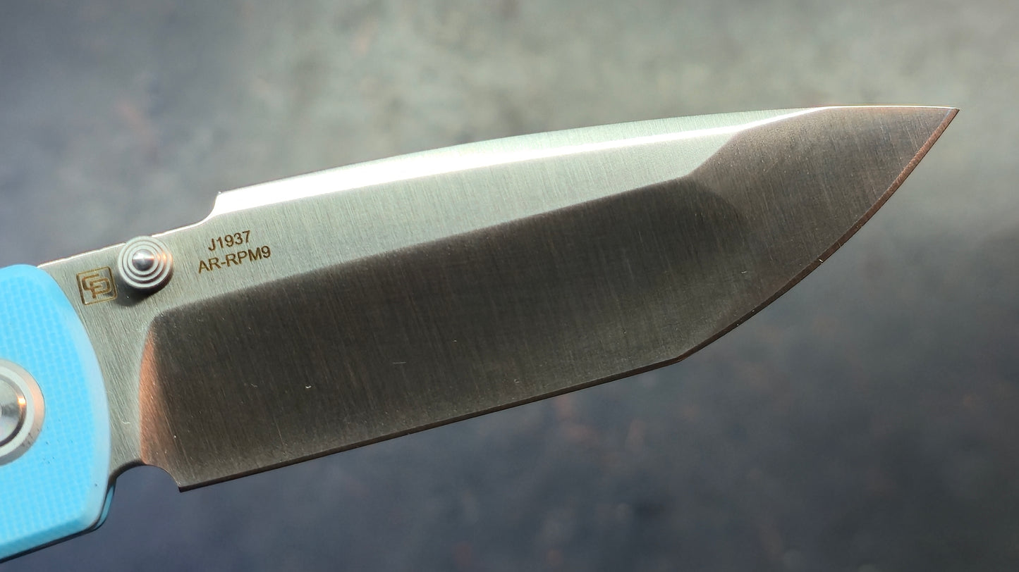 CJRB Nova Baby Blue G10 Handle AR-RPM9 Blade