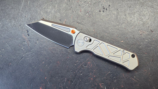 Trivisa Skarn-W Crossbar Lock Titanium Handle Satin M390 Modified Tanto Blade