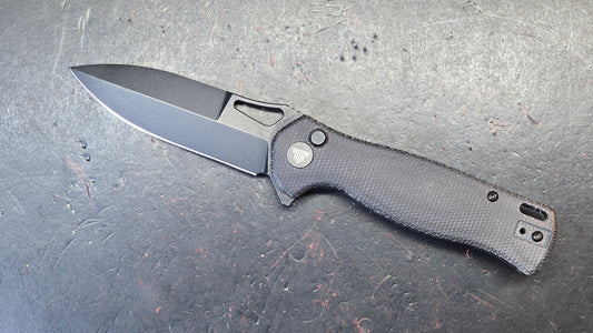 Trivisa Crateris-04B Button Lock Black Micarta Handle 14C28N Blade