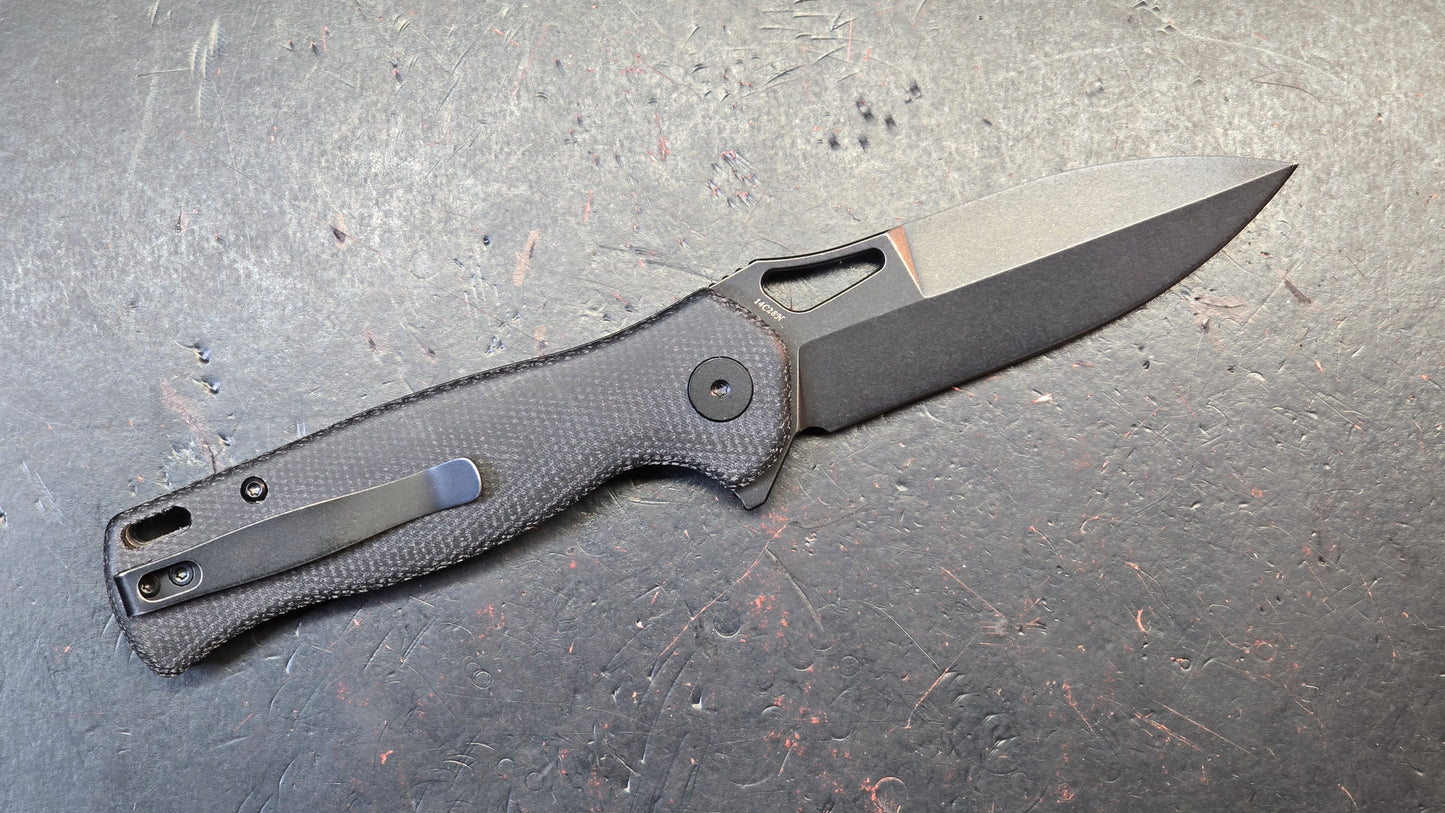 Trivisa Crateris-04B Button Lock Black Micarta Handle 14C28N Blade