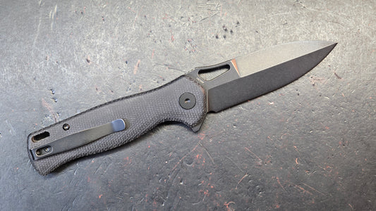 Trivisa Crateris-04B Button Lock Black Micarta Handle 14C28N Blade