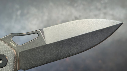 Trivisa Crateris-04B Button Lock Black Micarta Handle 14C28N Blade