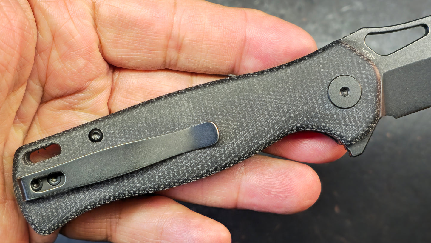 Trivisa Crateris-04B Button Lock Black Micarta Handle 14C28N Blade