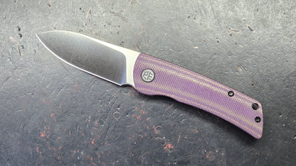 Petrified Fish Flavorist Purple Micarta Handle K110 Blade