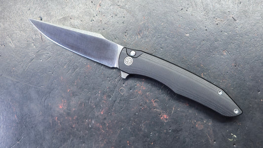 Petrified Fish Twigshark Button Lock G-10 Handle K110 Blade