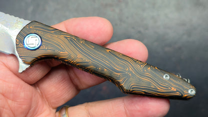 ArtisanCutlery Small Archaeo Double Detent Slipjoint Orange/Black G10 VG-10 Raindrop Damascus Blade,