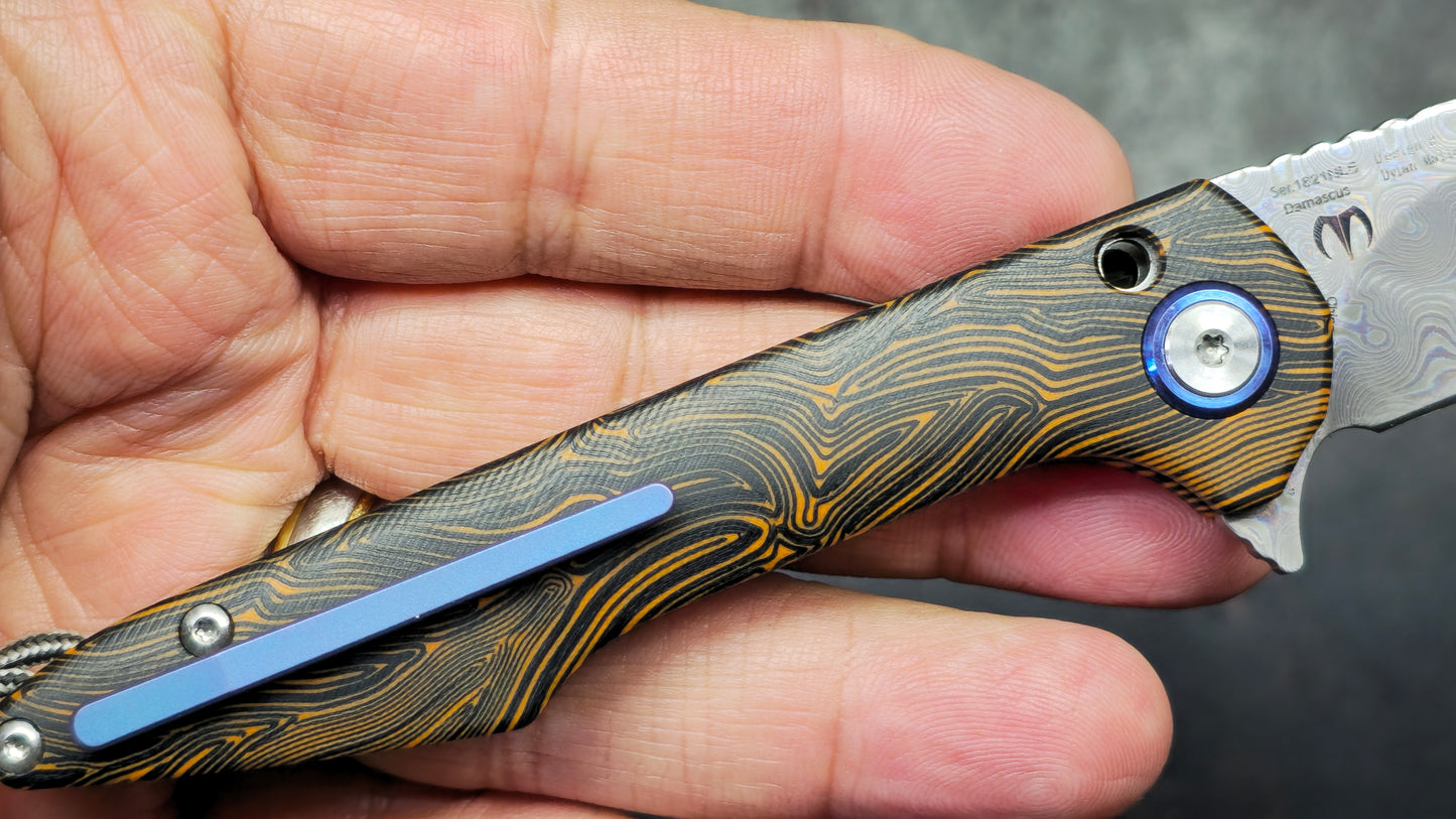ArtisanCutlery Small Archaeo Double Detent Slipjoint Orange/Black G10 VG-10 Raindrop Damascus Blade,
