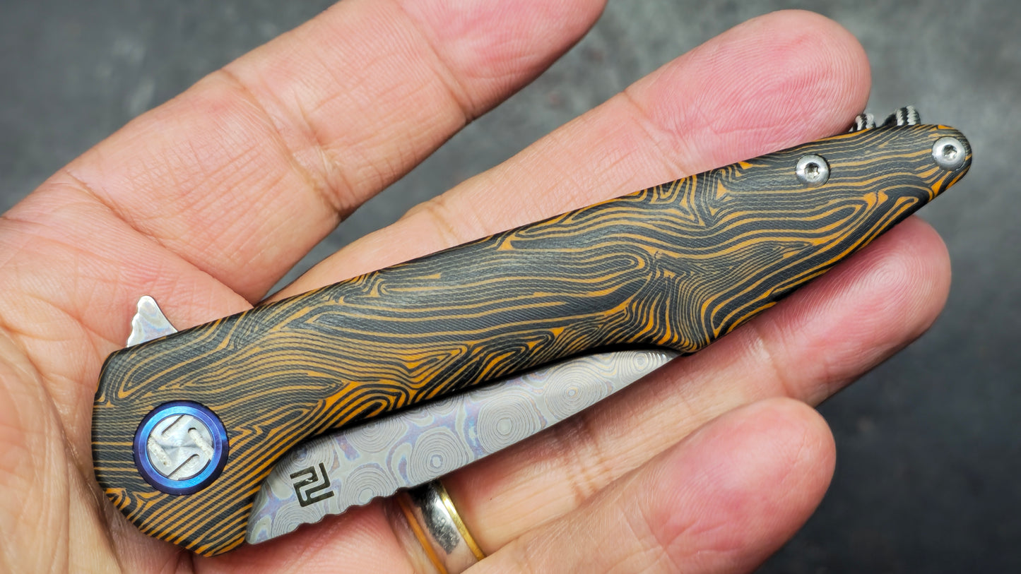 ArtisanCutlery Small Archaeo Double Detent Slipjoint Orange/Black G10 VG-10 Raindrop Damascus Blade,