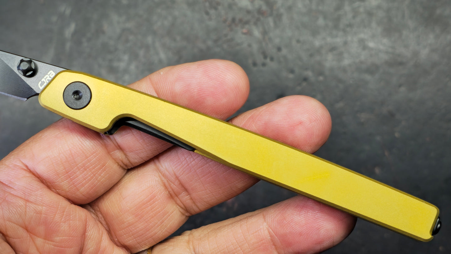 CJRB Lanky Gold Titanium Handle S90V Wharncliffe Black PVD Finish Blade