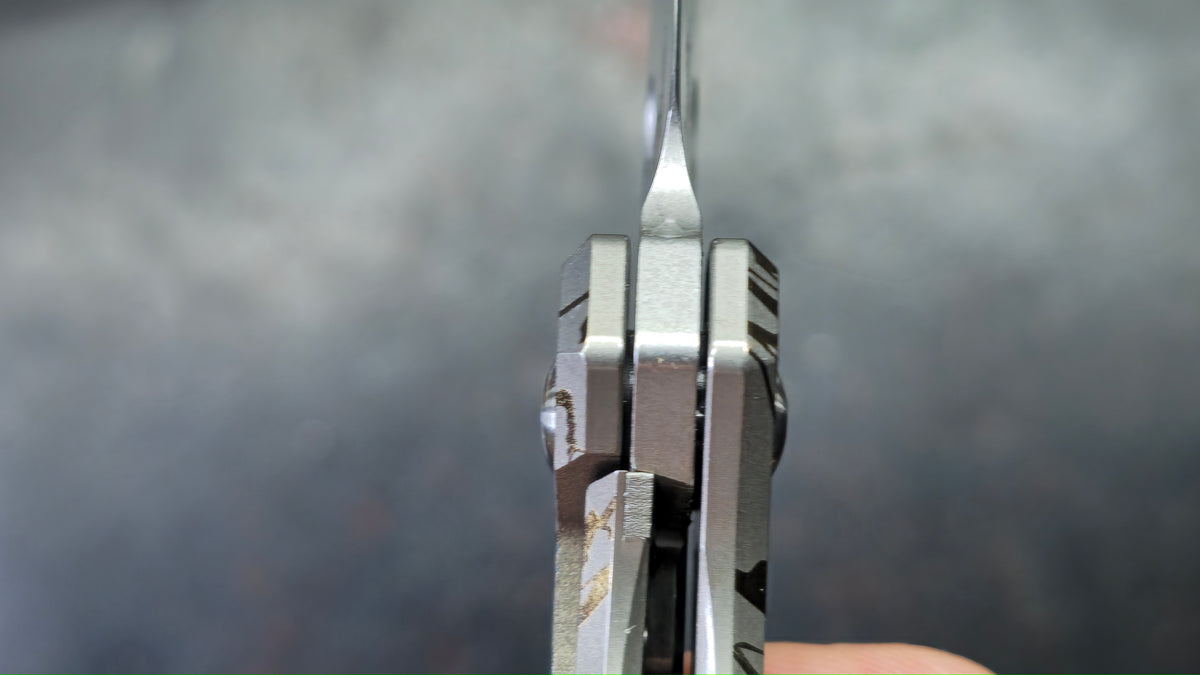 TwoSun TS570 Lined Titanium Handle 14c28n Blade