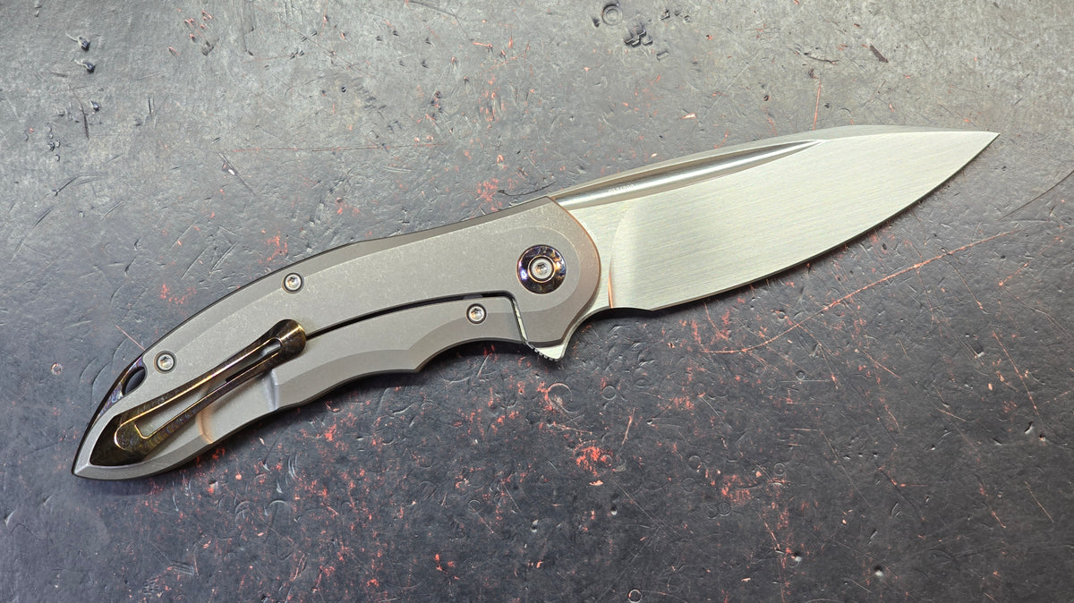 WE Knife Makani Titanium Aluminum Foil/Carbon Fiber Handle CPM 20CV Blade