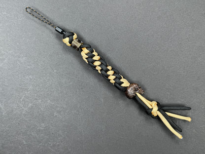 Custom Knife Lanyard – Black & Gold Paracord with Handmade Skull Bead