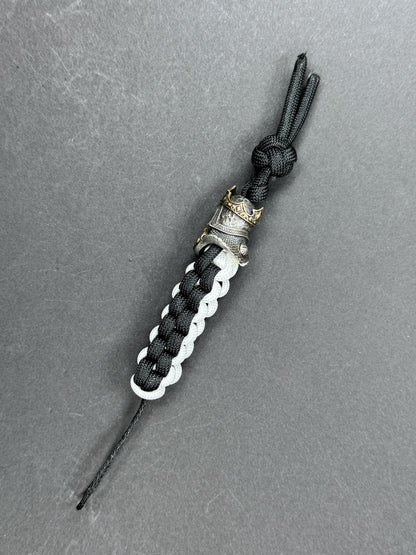 Custom Knife Lanyard – Black & White Paracord with Intricate Skull King Bead