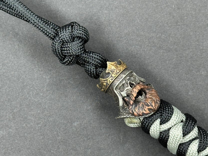 Custom Knife Lanyard – Black & White Paracord with Intricate Skull King Bead