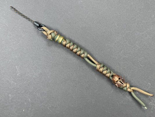 Custom Knife Lanyard – Brown & Green Paracord with Intricate Warrior Helmet Bead