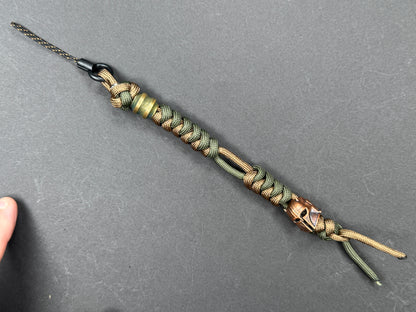 Custom Knife Lanyard – Brown & Green Paracord with Intricate Warrior Helmet Bead