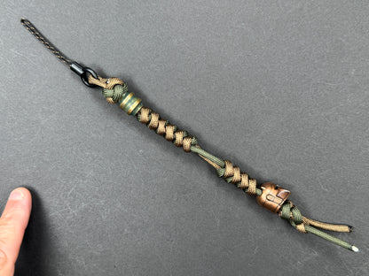 Custom Knife Lanyard – Brown & Green Paracord with Intricate Warrior Helmet Bead