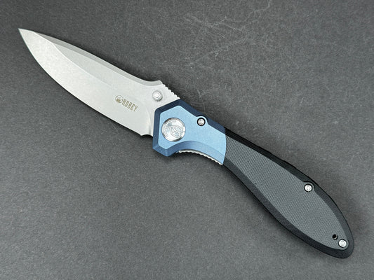 KUBEY Ruckus (KU314A) Folding, Liner Lock , AUS10, Stonewash, Drop Point, Plain Edge, Flat Grind, Handle: Titanium/ G10/Black/ Blue, (NEW - OPEN BOX)